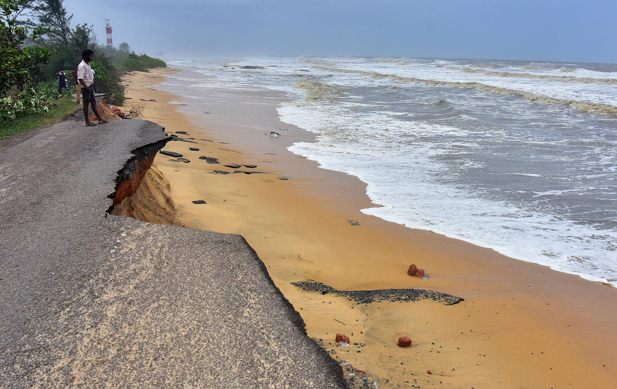 The NITK Beach road has been damaged in the fury of the waves, at Surathkal. Credit: DH Photo
