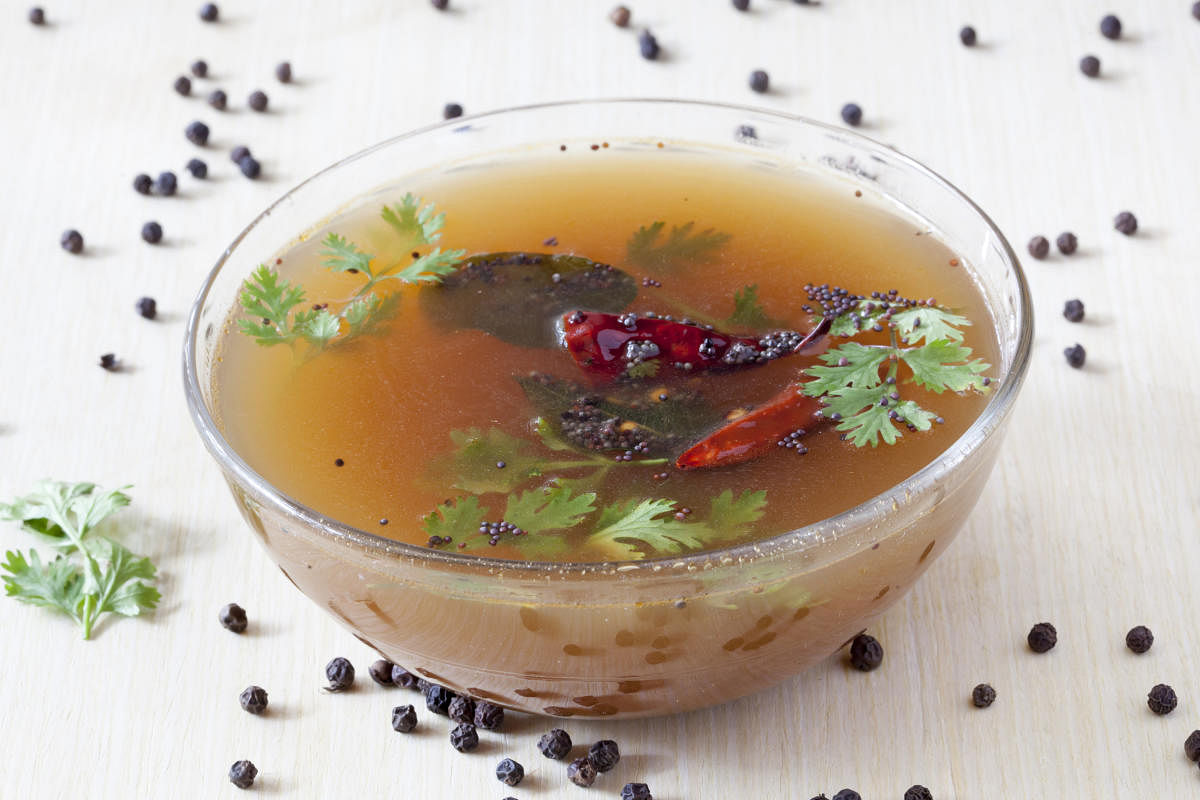 Pepper rasam is a popular comfort food that can be served with steamed rice and ghee.