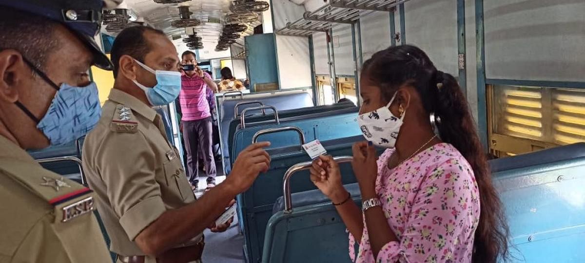 The railways police personnel are handing out their visiting cards to passengers. The department hopes the initiative will give a friendly makeover to its image, and help passengers in distress.