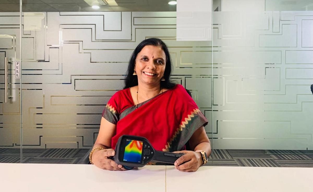 Geetha Manjunath, founder of Niramai Health Analytix, is seen holding Thermalytix.
