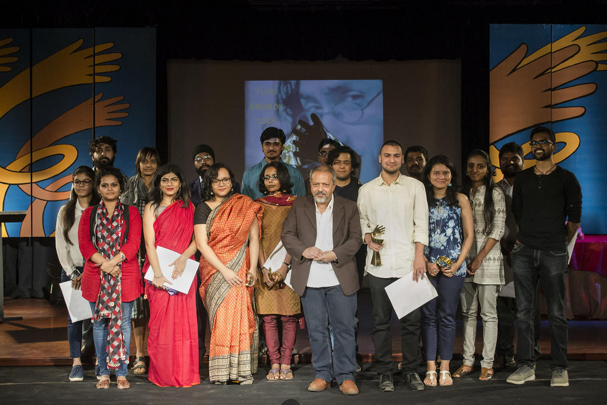 Chief guest and theatre director Sunil Shanbag with the winners of the 2018 TOTO Awards. 