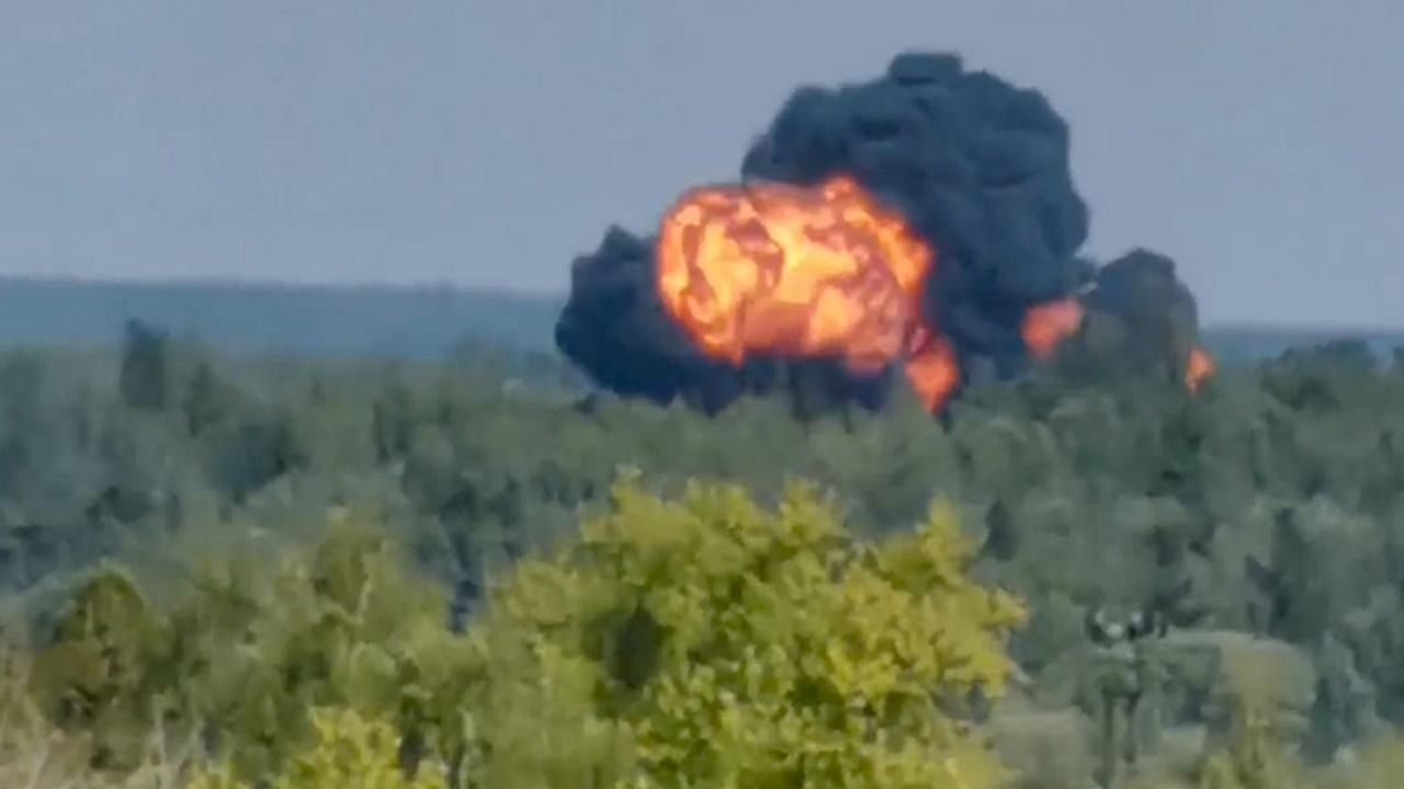 In this handout photo taken from video provided by Dmitry Ovchinnikov, flame and smoke rise from the place where the new light military transport plane Il-112V crashes near Kubinka airfield about 45 kilometers (28 miles) west of Moscow, Russia, Tuesday. Credit: AP Photo