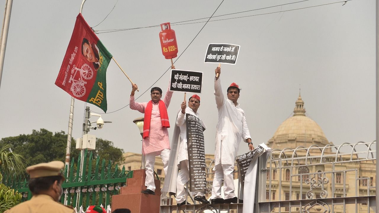 Samajwadi Party (SP) leaders stage a protest on the first day of the Monsoon Session of Uttar Pradesh Assembly. Credit: PTI Photo