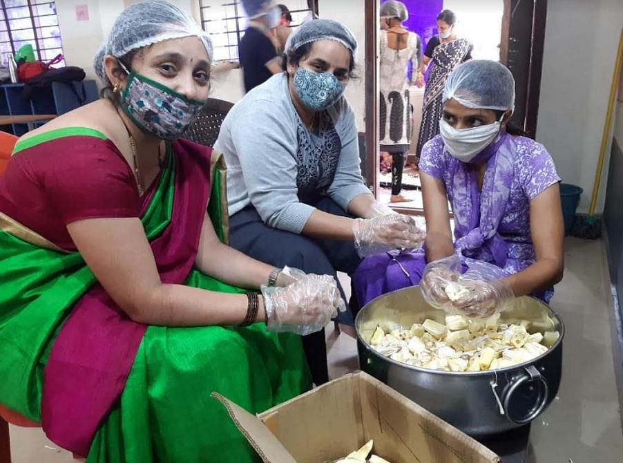 Staff members of Ambika Group of Institutions preparing chips. Credit: DH Photo