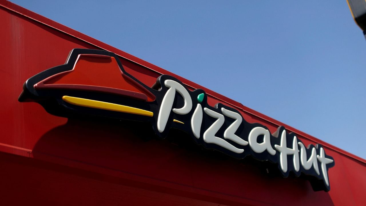 Pizza Hut, owned by US-based quick service restaurant (QSR) chain Yum Brands Inc, currently has 500 stores in India. Credit: Reuters Photo