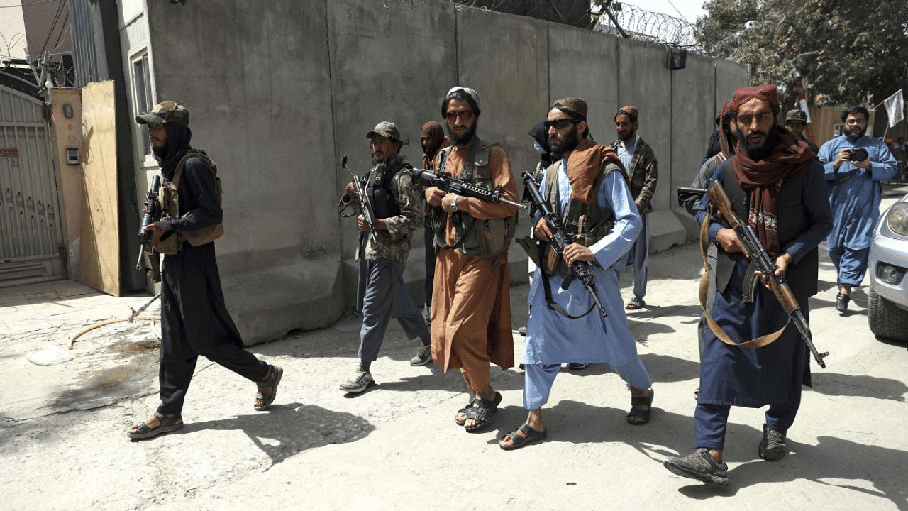 Taliban fighters patrol in Wazir Akbar Khan neighborhood in the city of Kabul, Afghanistan. Credit: AP Photo