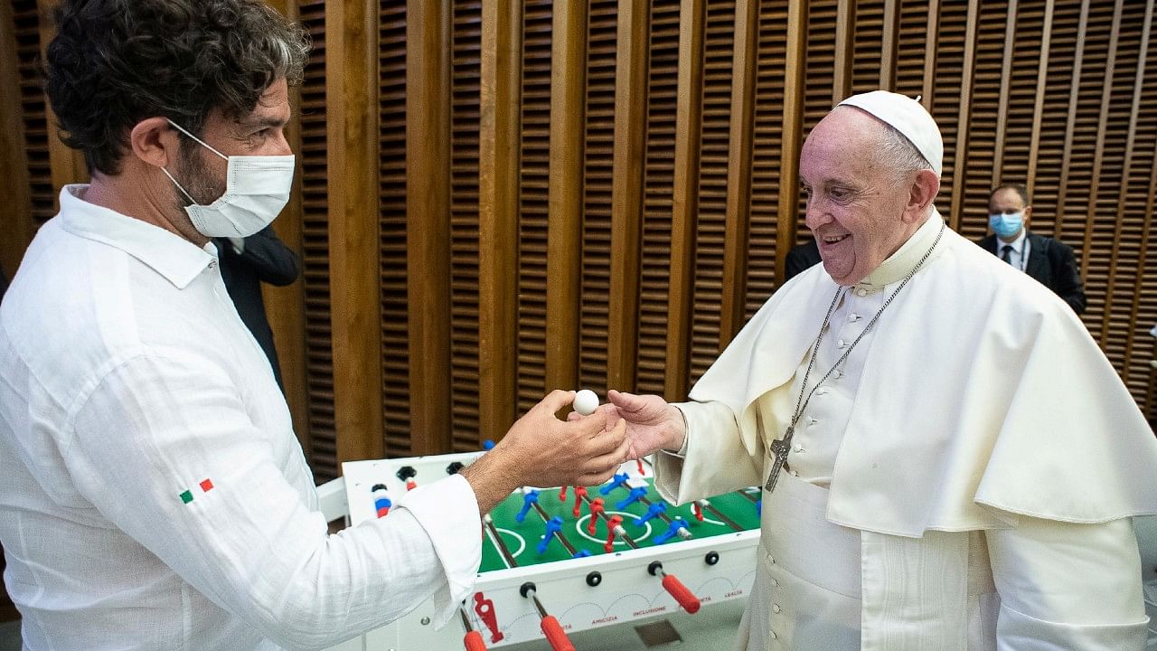 Pope Francis with his foosball table. Credit: Reuters Photo