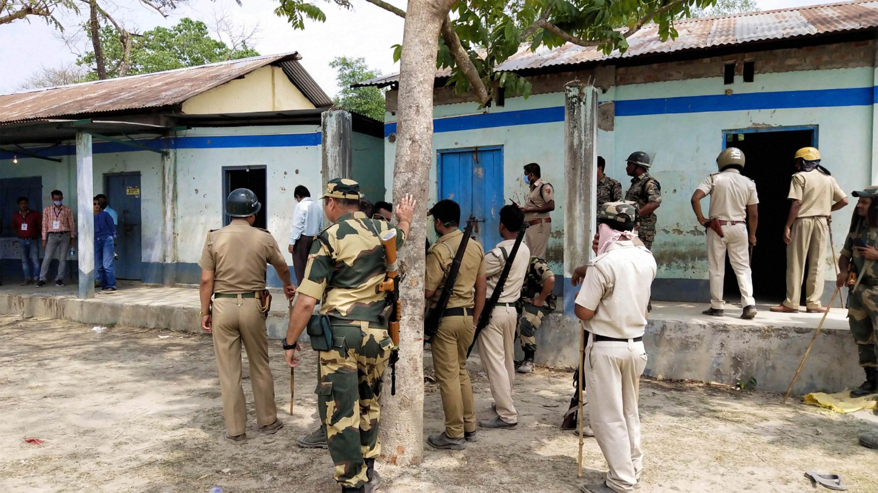 Security personnel keep vigil at a polling station after Election Commission ordered of stopping the voting exercise at polling station number 126 in Sitalkuchi, where clashes erupted between locals and central forces. Credit: PTI File Photo