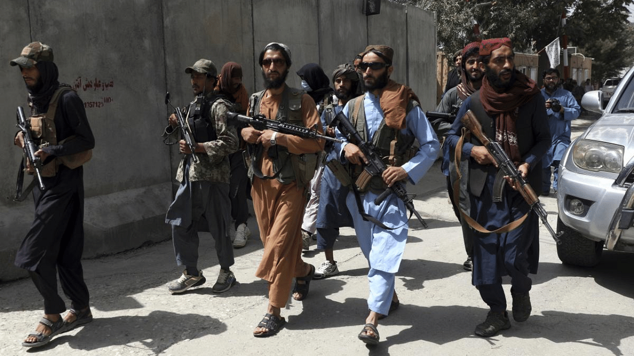  Taliban fighters patrol in Wazir Akbar Khan neighborhood in the city of Kabul, Afghanistan. Credit: AP Photo