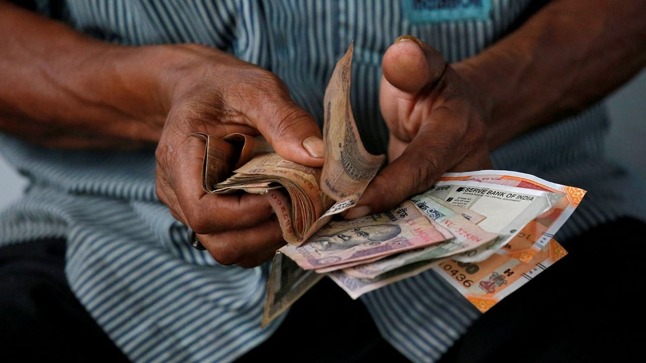 On Wednesday, the rupee had settled at 74.24 against the US dollar. Credit: Reuters Photo