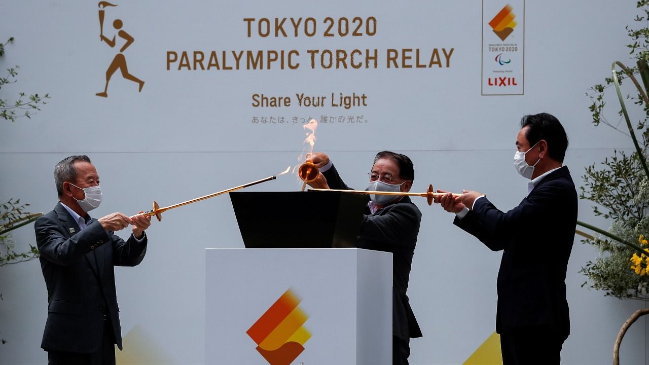 The celebration cauldron is lit by representatives of Tokyo municipal wards during Tokyo 2020 Paralympic Games. Credit: Reuters Photo