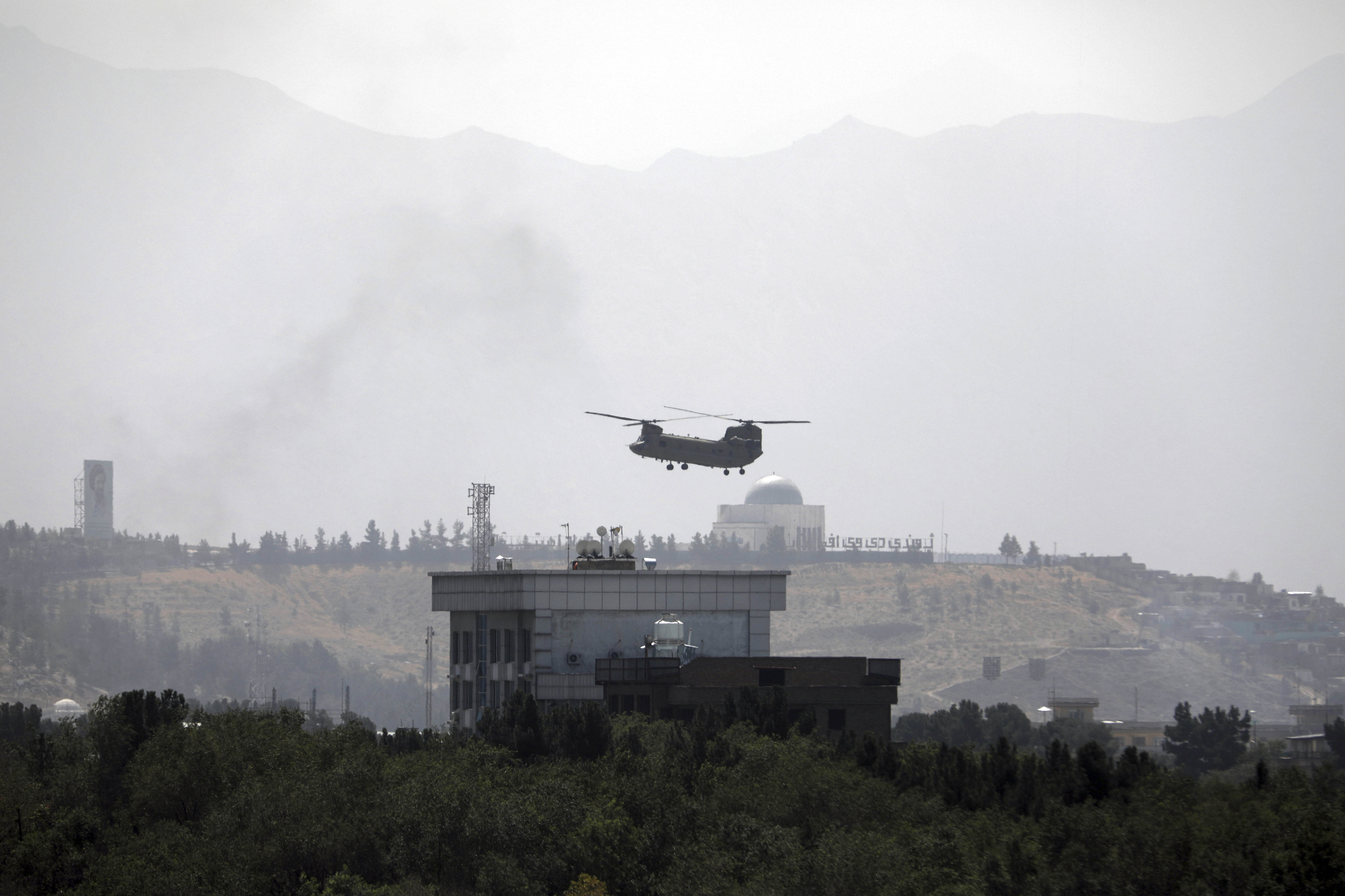 The US military had secured a portion of Hamid Karzai International Airport, just a few kilometers from the center of Kabul, but getting there, and then gaining access to the terminal, became nearly impossible. Credit: AP Photo/ Representative