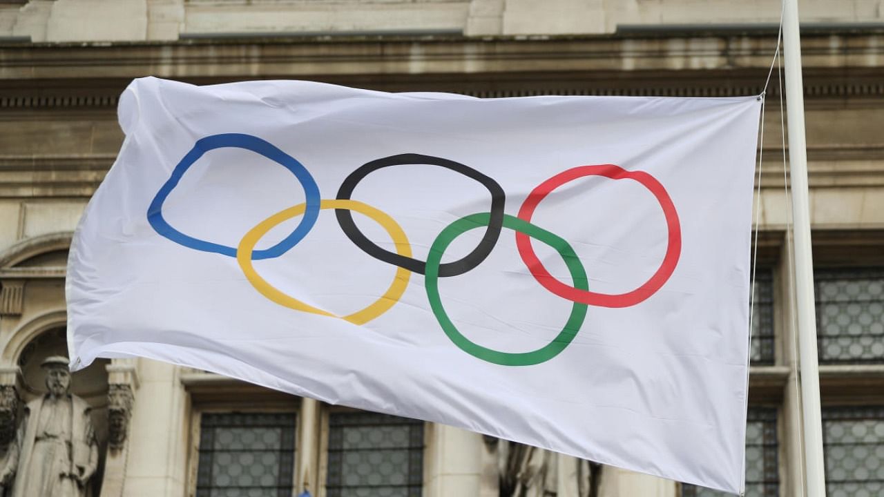The Olympic flag is seen raised during a ceremony with french Olympic medallists outside Paris City hall. Credit: Reuters File Photo