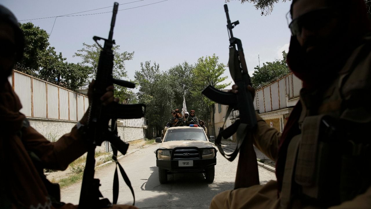 Taliban fighters patrol in Kabul. Credit: AP/PTI Photo