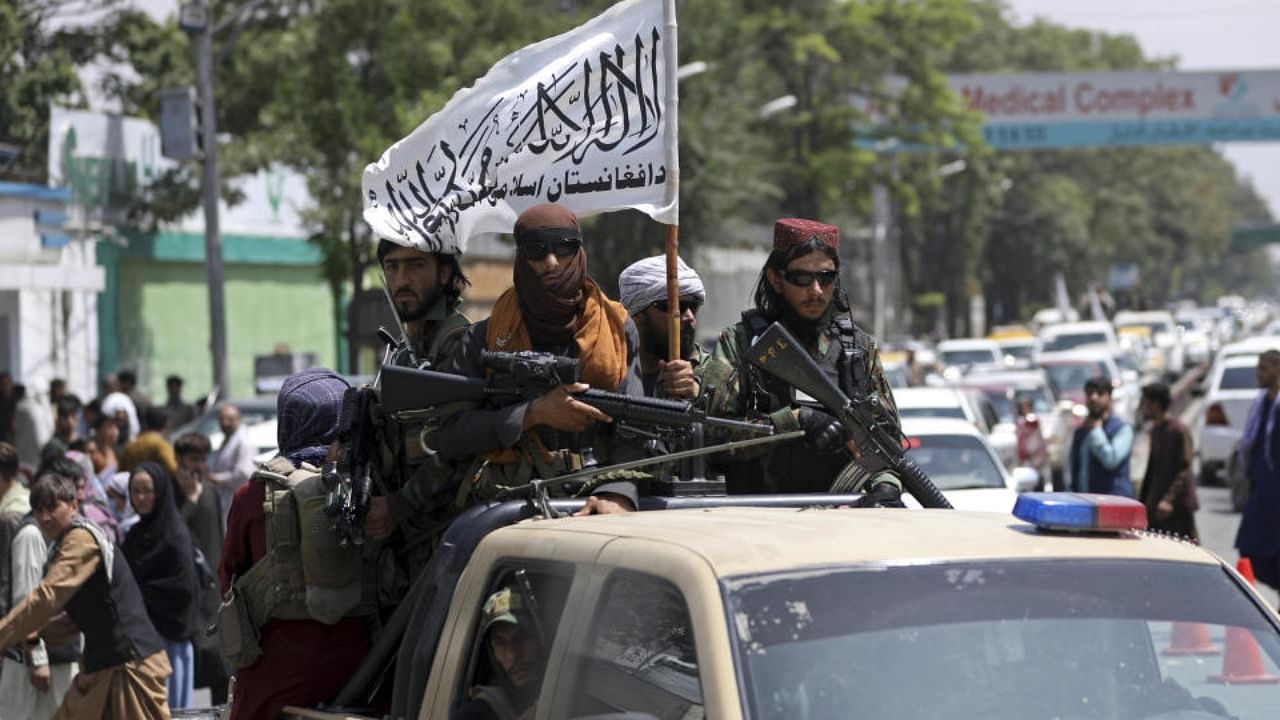Taliban fighters patrol in Kabul. Credit: AP Photo