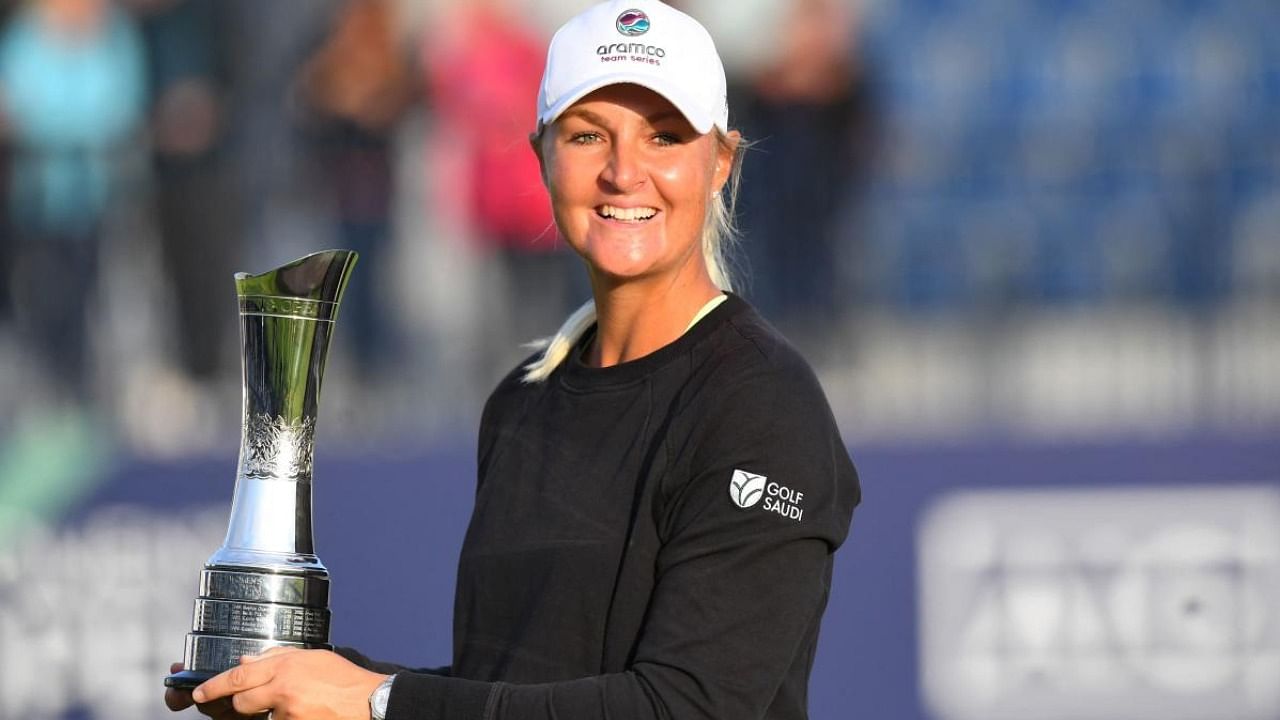 Sweden's Anna Nordqvist poses with the trophy after her victory in the Women's British Open, after a final round 69 at Carnoustie, Scotland. Credit: AFP Photo