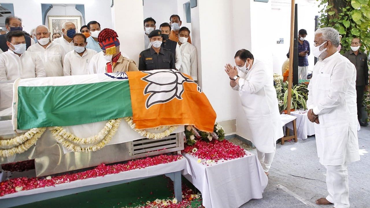 The photo, tweeted by the BJP, shows the body lying in state, draped by the Tricolour, but half of it was seen to be covered up by the party flag. Credit: Twitter/ @BJP4India