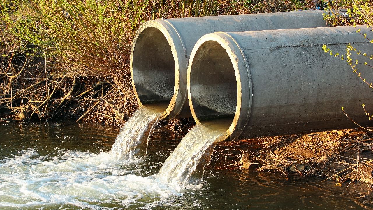 Puttur Tahsildar Ramesh Babu had complained that wastewater was discharged into the river and soak pits were constructed illegally on government land by the accused. Representative image. Credit: iStock photo