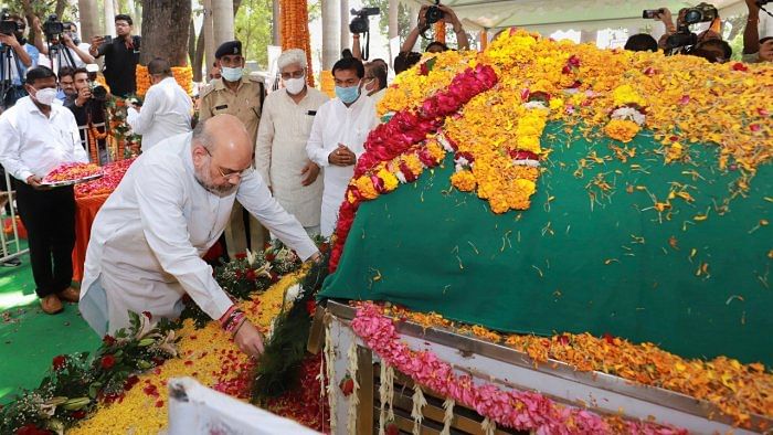 Union Home Minister Amit Shah pays homage to former UP chief minister Kalyan Singh during his funeral, in Aligarh. Credit: PTI Photo