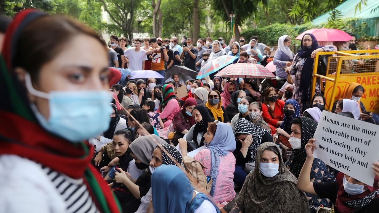 People protest outside an United Nations High Commissioner for Refugees (UNHCR) office to urge the international community to help Afghan refugees, in New Delhi. Credit: Reuters photo