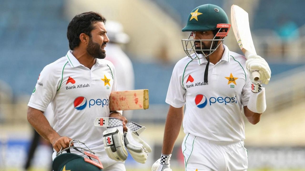 Mohammad Rizwan (L) and Babar Azam (R) of Pakistan. Credit: AFP Photo