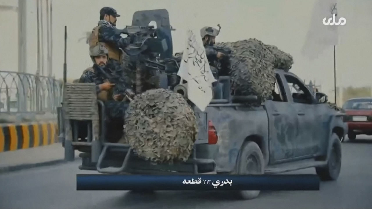 A video grab taken from Afghan TV RTA shows propaganda images of Taliban's Badri 313 Special Forces patrolling streets in an unidentified location in Afghanistan. Credit: AFP Photo