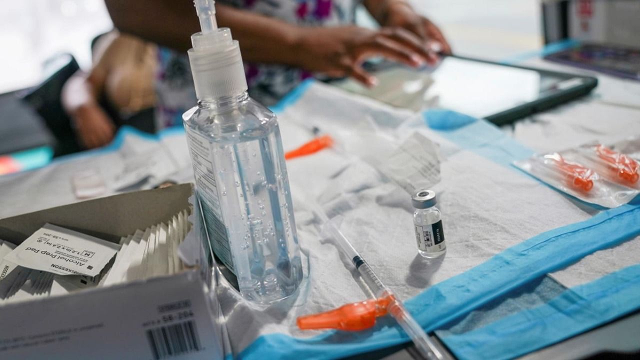 A nurse prepares to administer a dose of the Pfizer-BioNTech vaccine for the coronavirus disease (COVID-19), at a mobile inoculation site in the Bronx borough of New York City. Credit: Reuters Photo