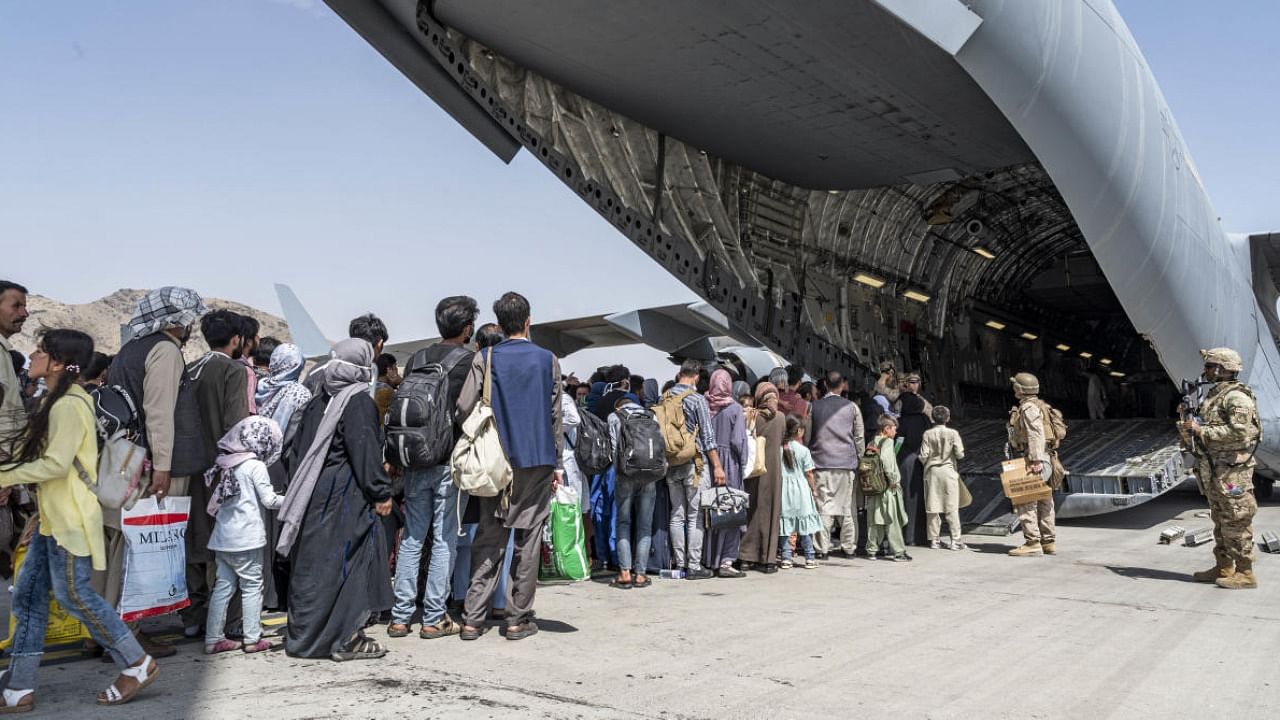 Afghanistan evacuation at Hamid Karzai International Airport. Credit: AP Photo