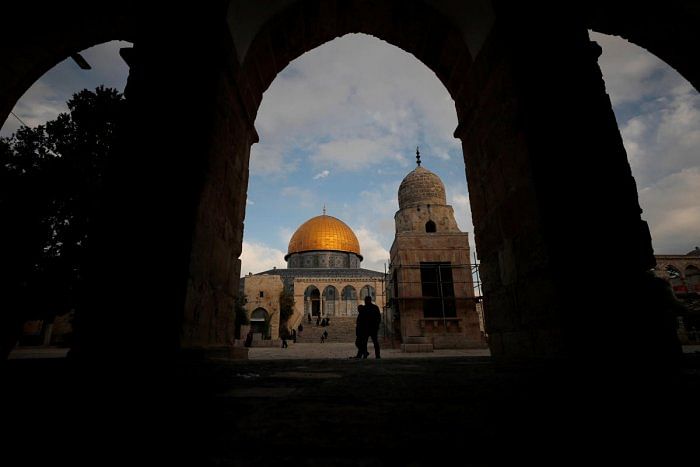 The Dome of the Rock is seen in the background as people visit the compound known to Jews as Temple Mount and to Muslims as Noble Sanctuary, in Jerusalem’s Old City. Credit: Reuters File Photo