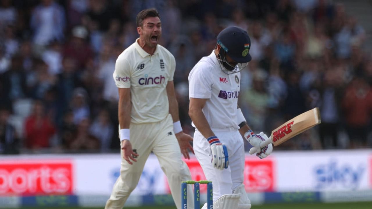 England's James Anderson celebrates taking the wicket of India's Virat Kohli. Credit: Reuters Photo