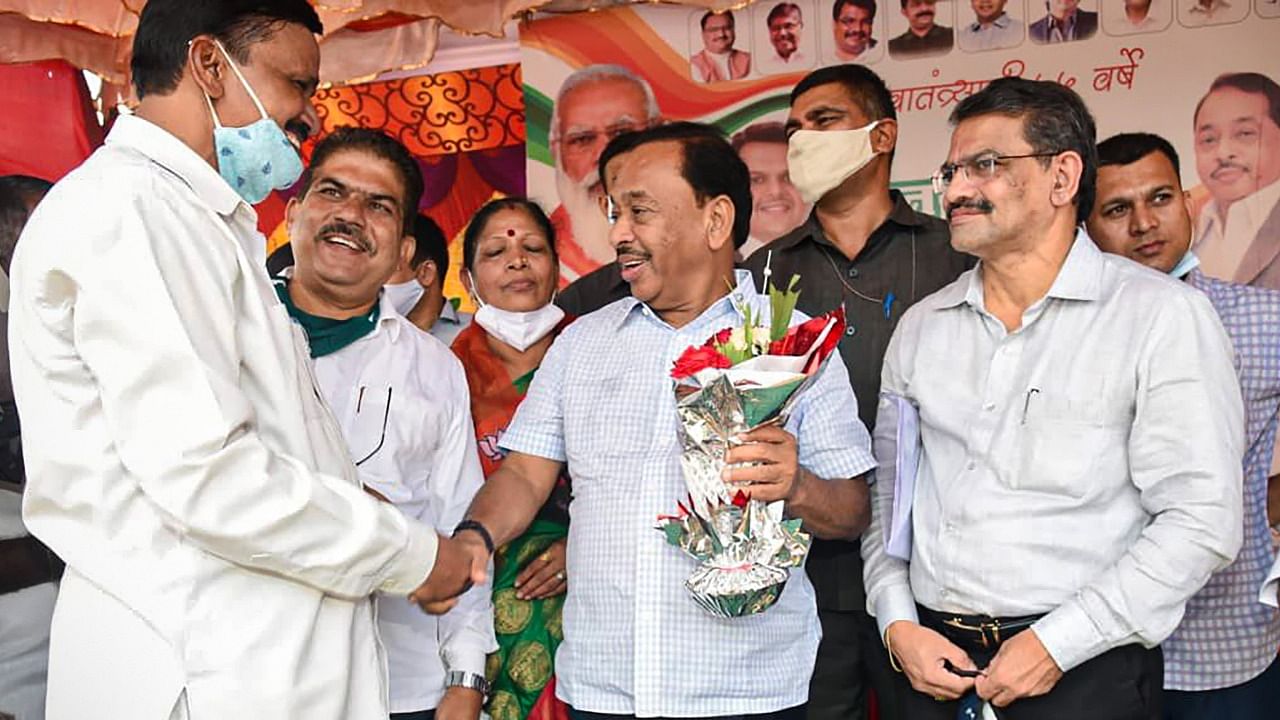 Union Minister Narayan Rane with BJP workers during the Konkan tour of 'Jan Ashirwad Yatra', at Sangameshwar in Ratnagiri district, Tuesday, August 24, 2021. Credit: PTI Photo