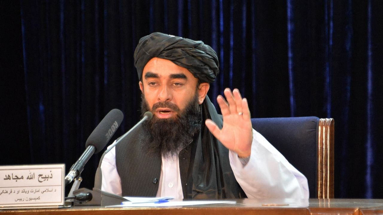 Taliban spokesperson Zabihullah Mujahid gestures as he speaks during a press conference in Kabul on August 24, 2021 after the Taliban stunning takeover of Afghanistan. Credit: AFP Photo