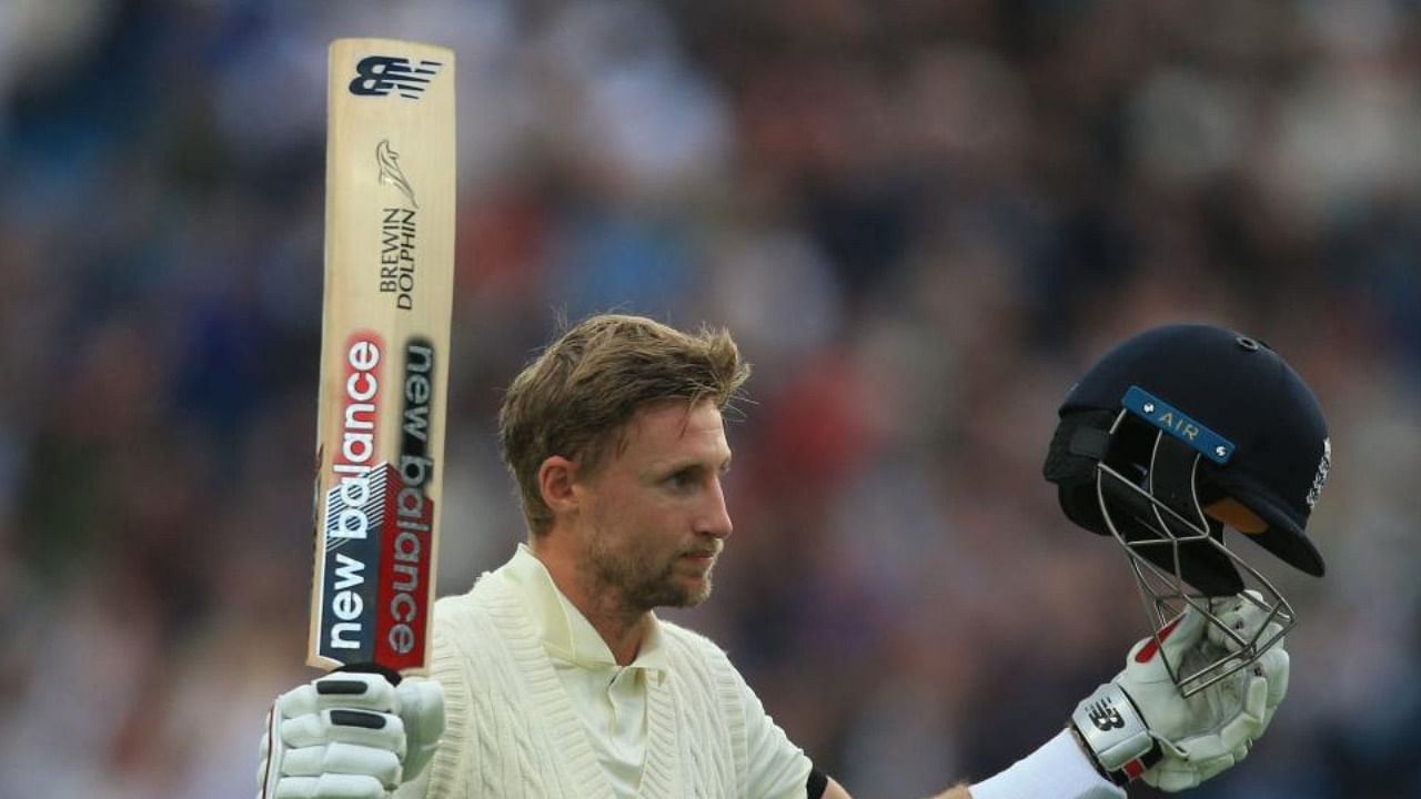 England's captain Joe Root gestures as he leaves the crease after losing his wicket for 121 on the second day of the third cricket Test match between England and India at Headingley cricket ground in Leeds, northern England, on August 26, 2021. Credit: AFP Photo