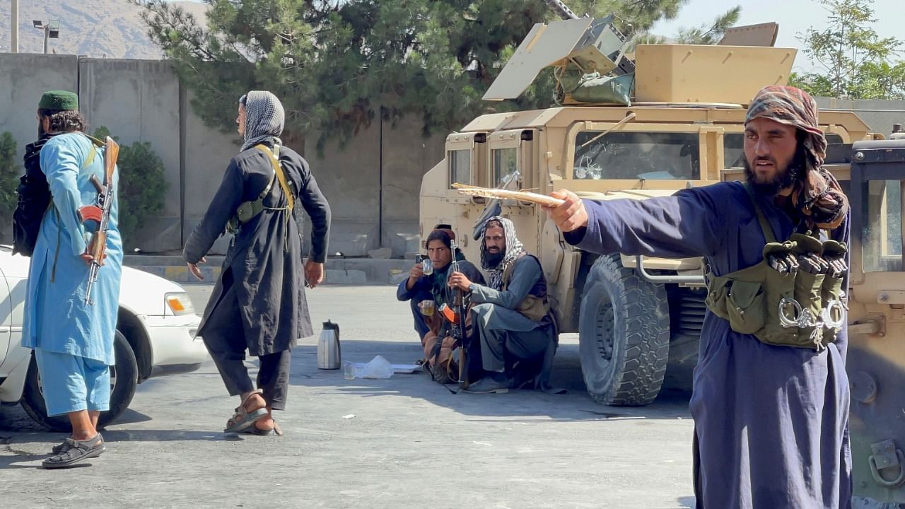 Taliban forces block the roads around the airport in Kabul, Afghanistan August 27, 2021. Credit: Reuters Photo