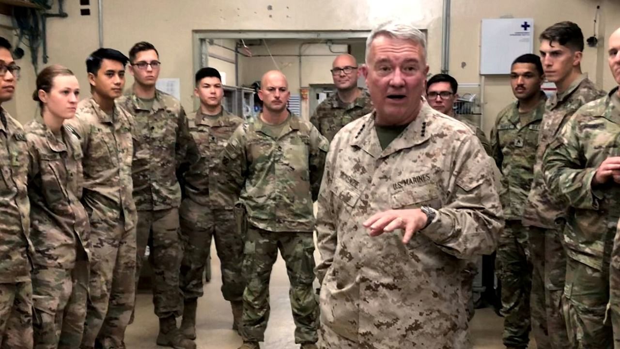 Marine General Kenneth McKenzie speaks with US troops while visiting Forward Operating Base Fenty in Jalalabad, Afghanistan. Credit: Reuters file photo