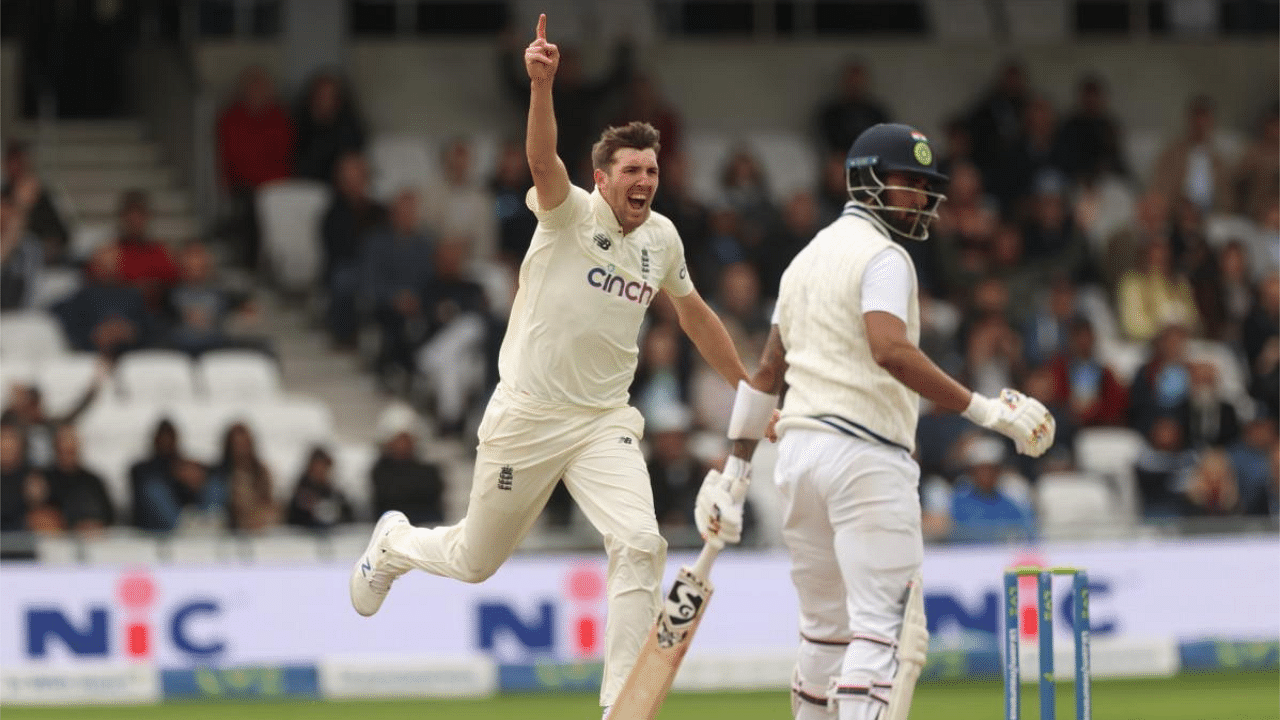 England's Craig Overton celebrates the wicket of India's KL Rahul. Credit: Reuters Photo