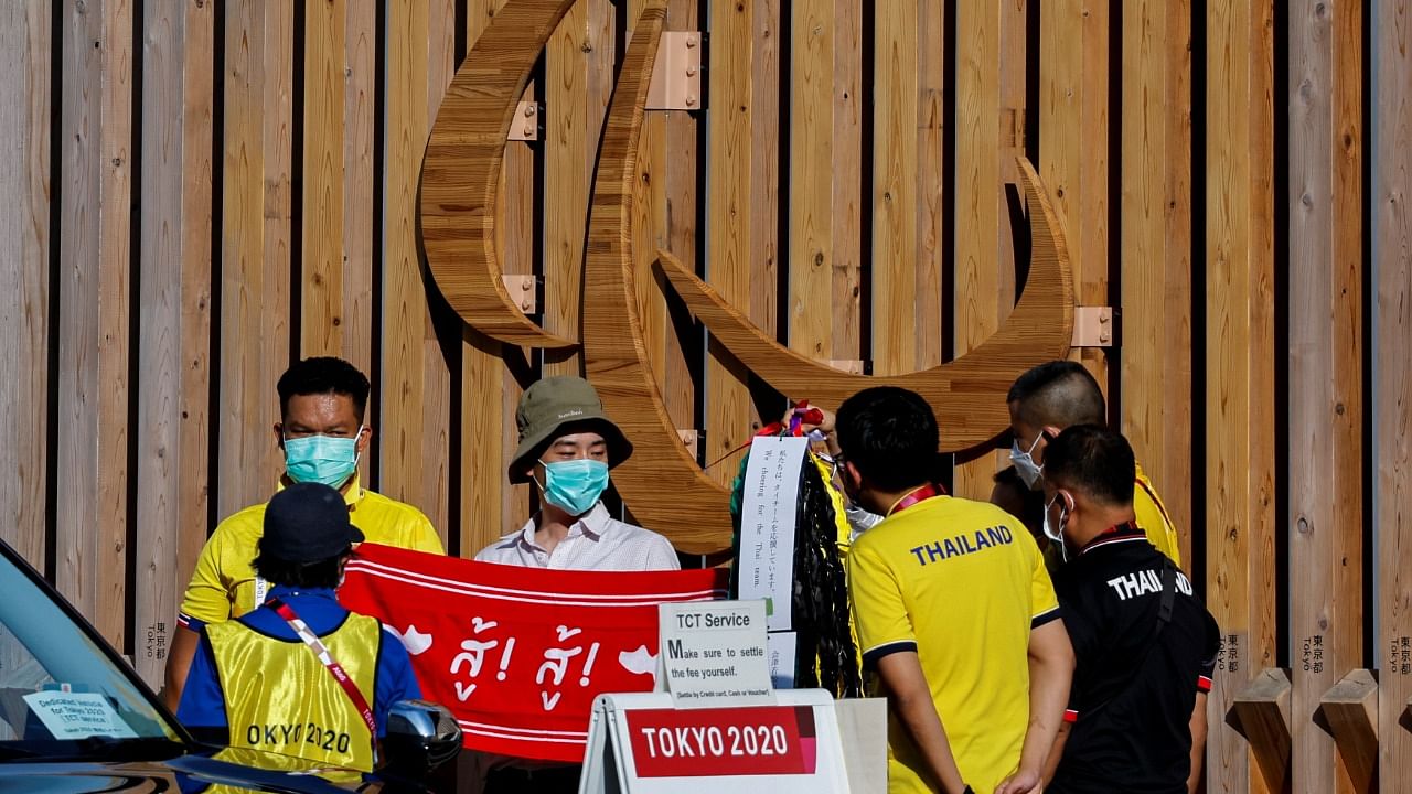 Athletes and team officials arrive at the athletes' village for Tokyo 2020 Paralympic Games ahead of the opening ceremony of the summer games, amid the coronavirus pandemic, in Tokyo, Japan August 23, 2021. Credit: Reuters Photo