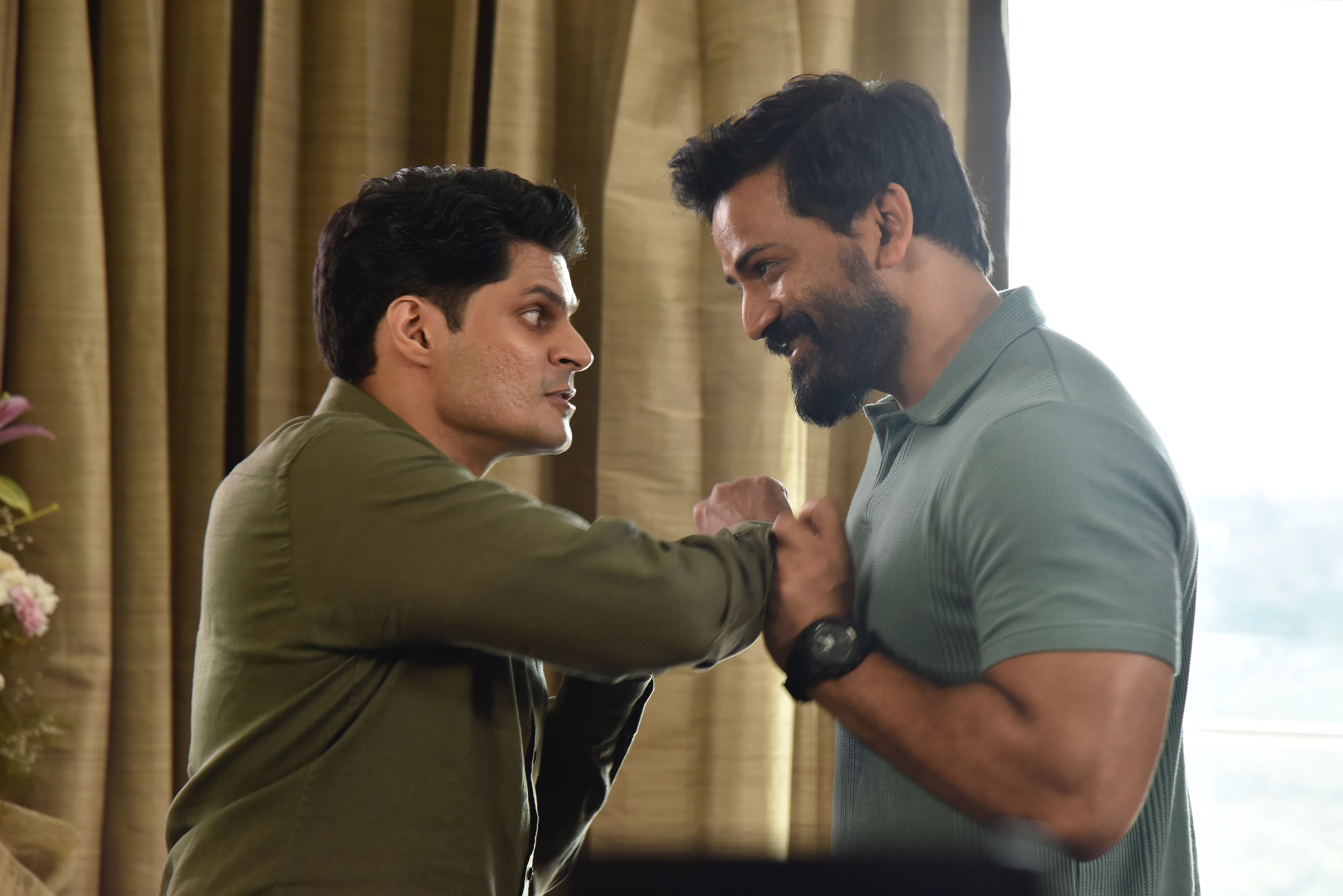 Dhananjaya (right) and Sudev Nair in a scene from the film. 