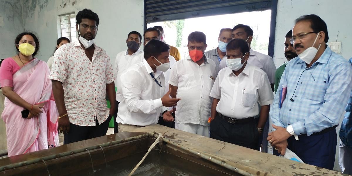 Minister for Fisheries, Port and Inland Water Transport S Angara inspects the Fish Seed Production and Rearing Farm at Harangi. Credit: DH photo