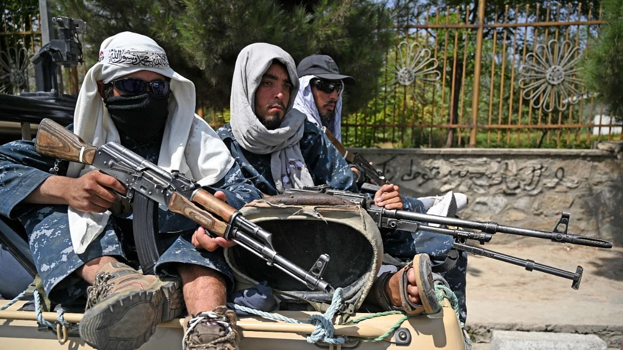 Taliban fighters patrol a street in Kabul. Credit: AFP Photo