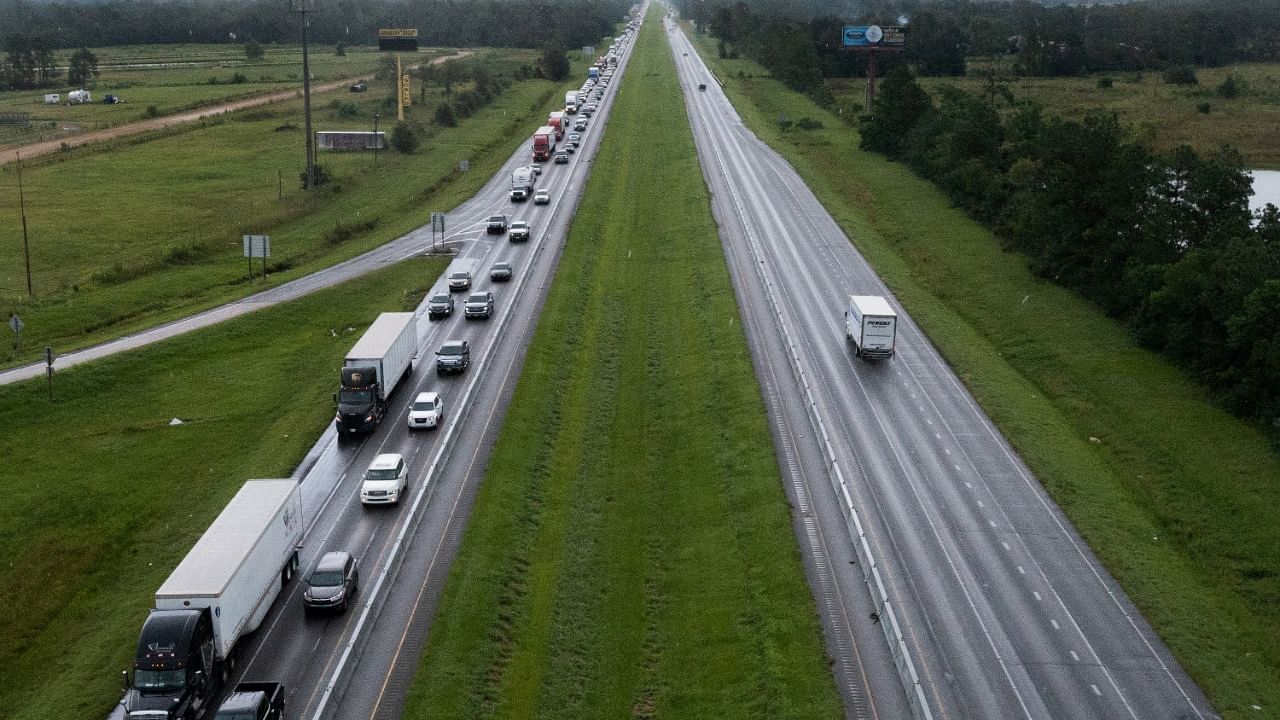 Traffic moves bumper to bumper along I-10 West as residents evacuate towards Texas before the arrival of Hurricane Ida in Vinton, Louisiana. Credit: Reuters photo