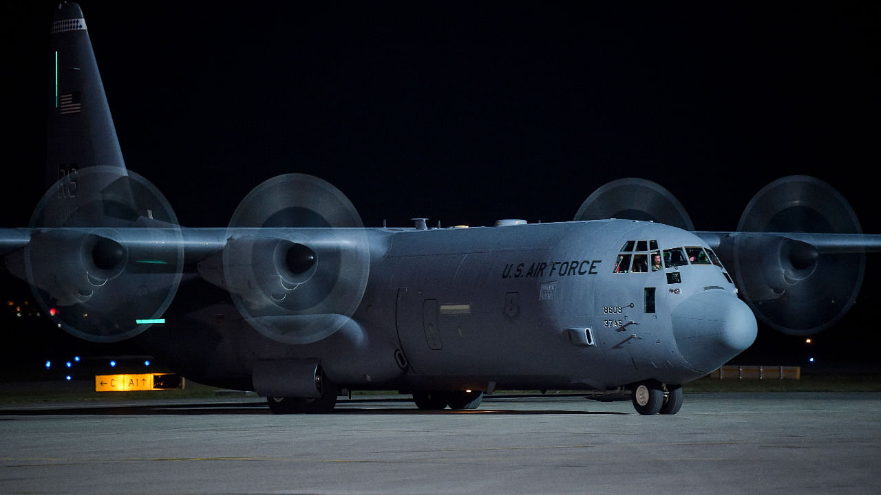 A US Air Force carrying Afghan refugee fleeing the Afghan capital Kabul, taxis is at Pristina International airport near Pristina. Credit: AFP Photo