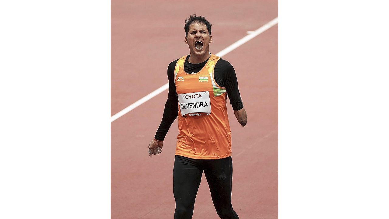 Indian javelin thrower Devendra Jhajharia reacts after winning silver medal at the Tokyo Paralympics. Credit: PTI Photo