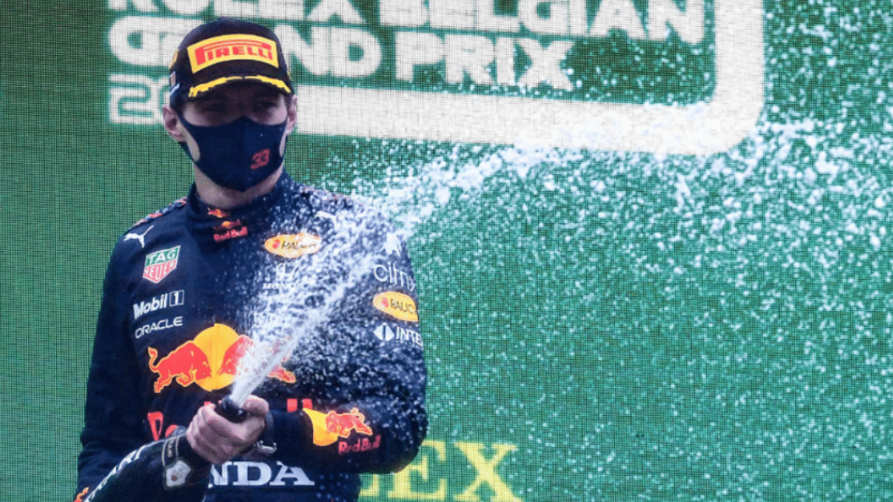 Verstappen celebrates his Belgian GP win. Credit: AFP Photo