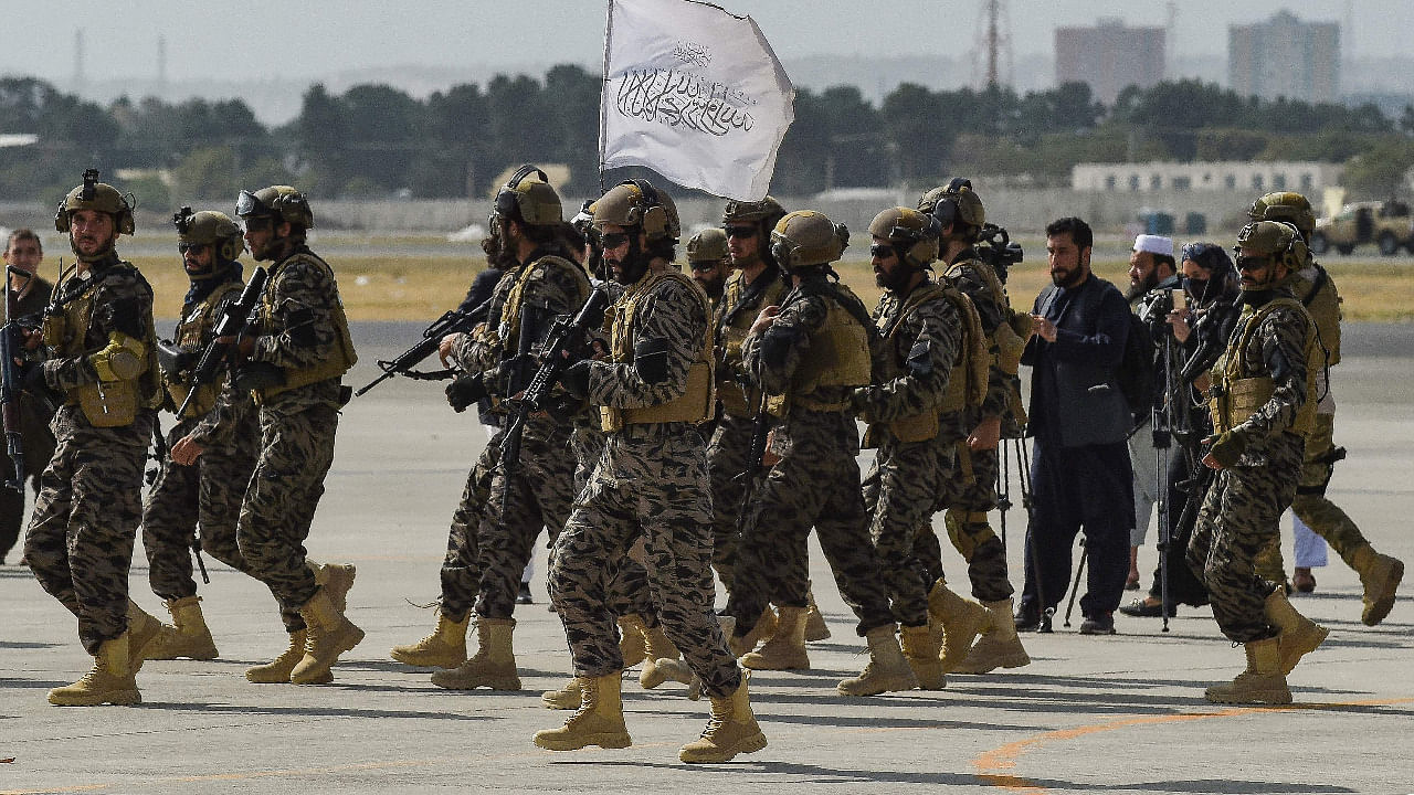 Taliban Badri special force fighters arrive at the Kabul airport. Credit: AFP Photo
