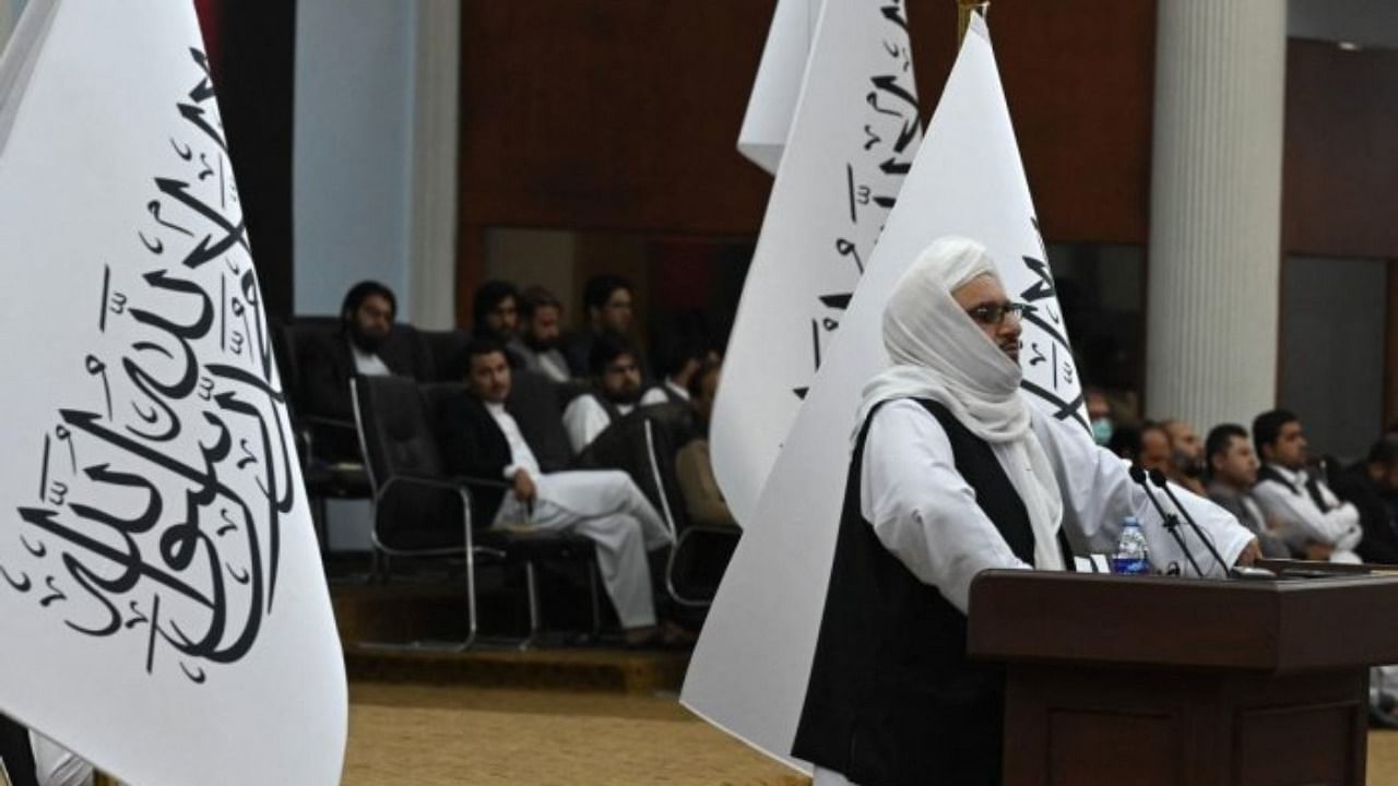 Taliban’s acting Higher Education Minister Abdul Baqi Haqqani speaks during a consultative meeting on Taliban's general higher education policies at the Loya Jirga Hall in Kabul on August 29, 2021. Credit: AFP Photo