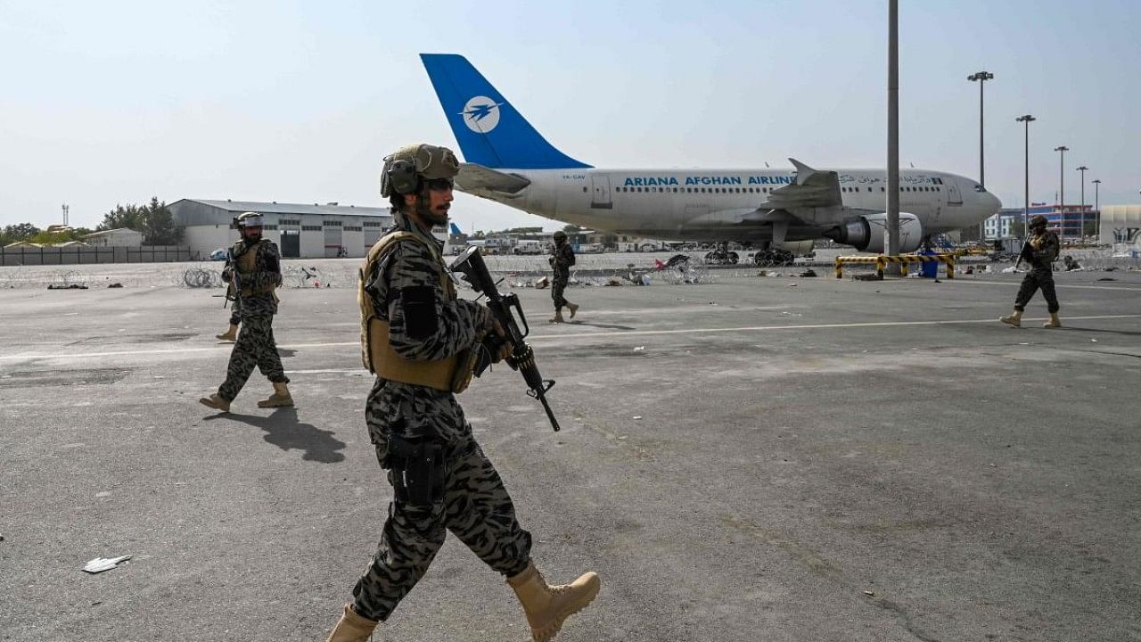Taliban Badri special force fighters secure the airport in Kabul. Credit: AFP Photo
