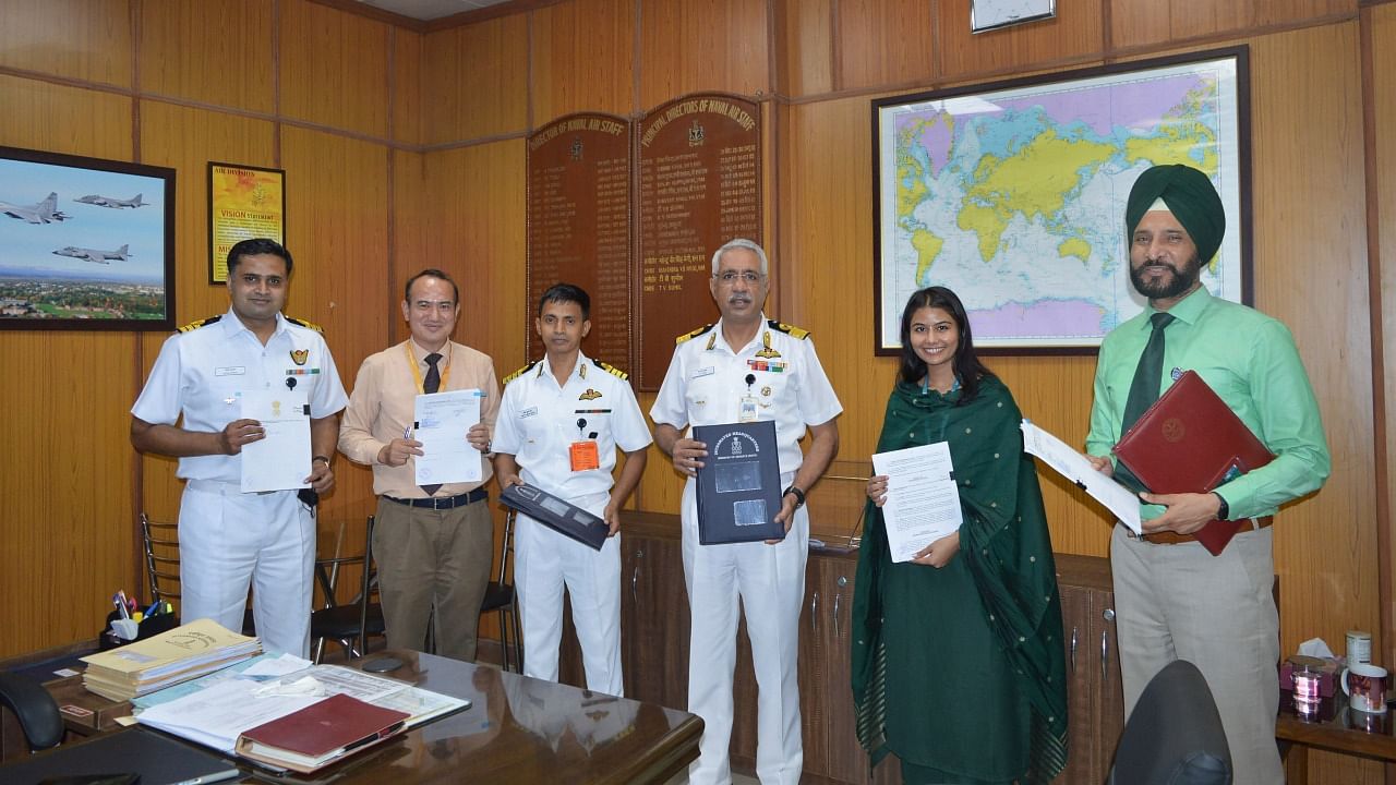 Indian Naval officers and DRDO representatives during the signing of a contract with Navratna Defence PSU Bharat Limited (BEL) for supply of the first indigenous comprehensive Naval Anti Drone System (NADS) with both hard kill and soft kill capabilities, in New Delhi, Tuesday, August 31, 2021. Credit: PTI Photo