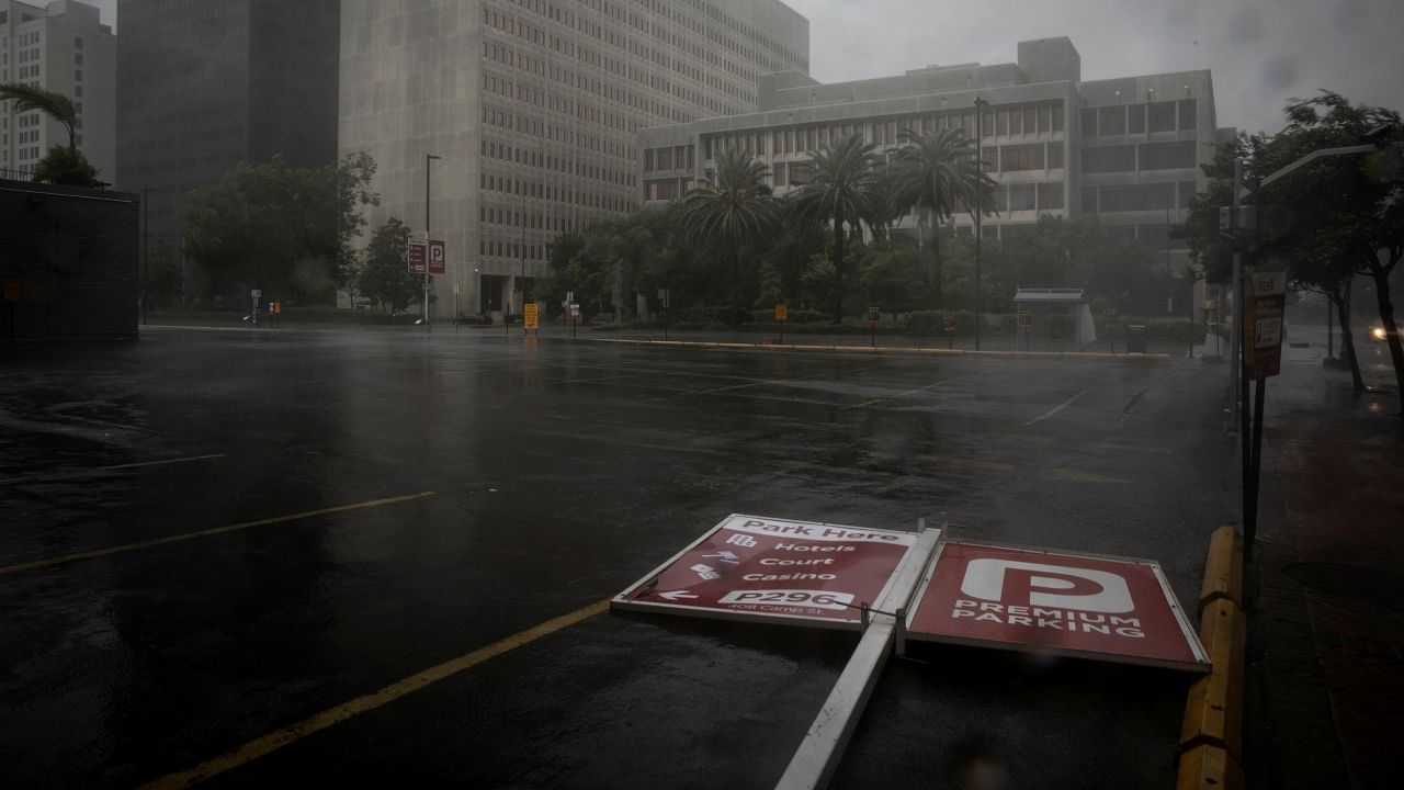 A parking sign lies in the street as Hurricane Ida makes landfall in Louisiana. Credit: Reuters Photo