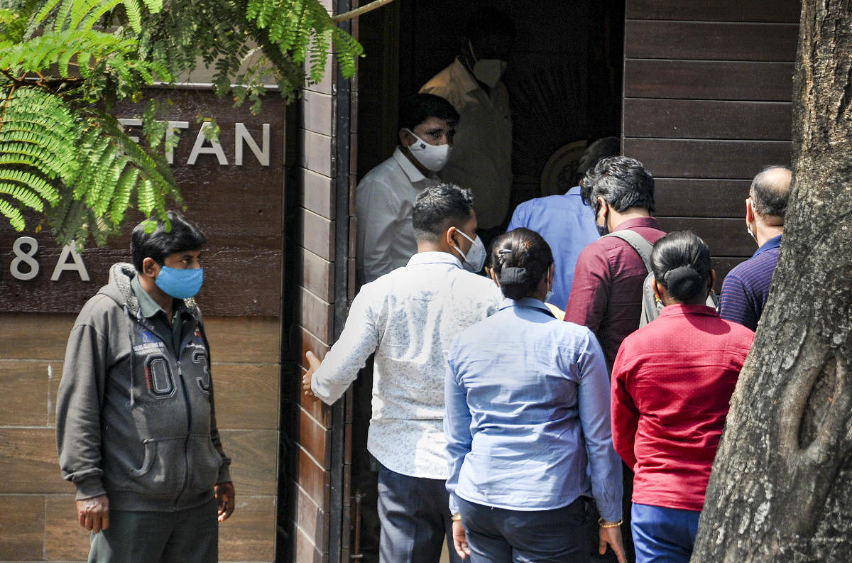 CBI officials arrive at the residence of TMC MP Abhishek Banerjee to question his wife Rujira Banerjee in connection with an alleged coal smuggling scam in February, 2021. Credit: PTI File Photo